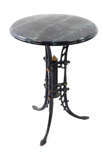 A Victorian Aesthetic Movement cast iron table base, with parcel gilt black painted base, on three outsplayed legs, later green marble circular top, 54cm diameter.