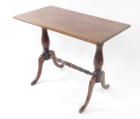 A Victorian and later mahogany occasional table, with rectangular top, turned upright stretcher, and splay legs, 89cm x 47cm.