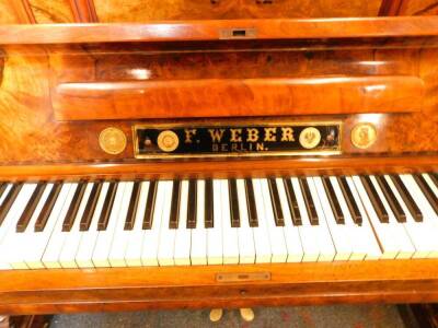 A 19thC German figured and burr walnut cased upright piano by F Weber of Berlin, the case having blind fret and applied moulded decoration, cast brass side handles, the interior revealing a brass over wood overstrung mechanism, and label VNWIEN 1875 C Gol - 2