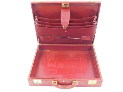 A Le Must De Cartier red leather briefcase, with brass fittings and mounts, Rd 1975, 43cm wide. - 3