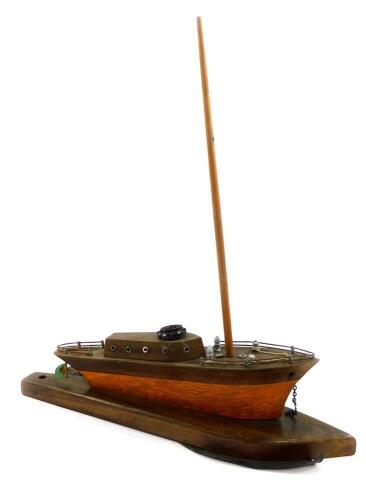 An early 20thC table lamp, modelled as a sailing ship with a Bakelite fitting, 42.5cm wide.