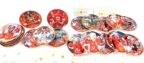 Manchester United. Danbury Mint Champions collectors plates, with certificates. (24)