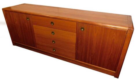 A d-SCAN teak sideboard, with four central drawers enclosed by single cupboards, having brass campaign style handles, 75cm high, 201cm wide, 50cm deep.