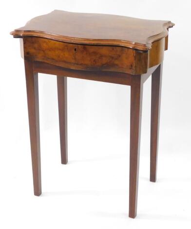 A Victorian walnut serpentine work table, with fitted interior, and placed on a later square framed base, 60cm x 43cm.