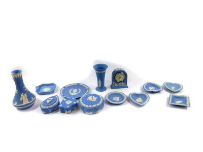 A group of Wedgwood light blue Jasperware, mostly boxed, including a mantel clock, vase, boxes and covers, twin handled dish, further dishes and plate, etc. (a quantity)