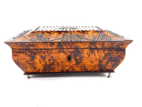 A Regency burr yew wood sarcophagus form casket converted to a musical box, the hinged lid with steel pin work decoration, mother of pearl reserve monogram engraved, 8cm high, 19cm wide, 13.5cm deep.