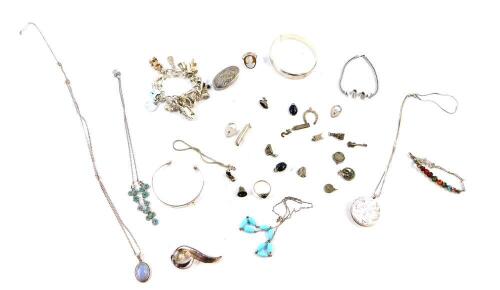 Silver and gem set jewellery, including bangles and bracelets, a charm bracelet, rings, and a brooch, together with a pill box, 209.4g. (a quantity)