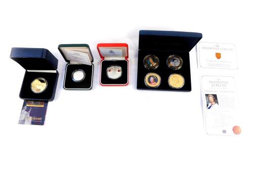 A HM Queen Elizabeth II Diamond Jubilee four coin set, London Mint Changing Face of Britain's Coinage Britannia silver gilt medal., a QEII Golden Wedding Anniversary silver proof £5 coin., and a 1995 WWII silver proof £2 coin. (4)