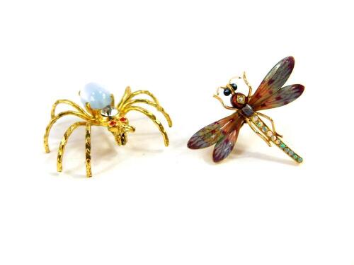 An enamel diamond and opal set dragonfly brooch, in yellow metal, stamped 14k, 5.1g., together with a costume brooch modelled as a spider. (2)