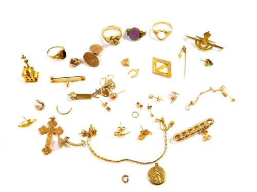 Assorted gold jewellery and scrap gold, including a cross pendant, rope twist ring, RAF badge and a St Christopher pendant, 43.3g.