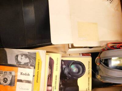 A Eumig Cine camera, model C3., Kodak camera, Zenit 11 camera, tripods, accessories and books. (a quantity) - 4