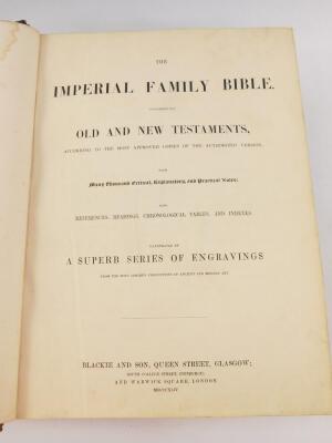 A Victorian illustrated Imperial family bible, with canvas and leather binding.