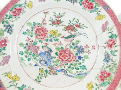 Three antique porcelain chargers, comprising a 19thC riveted Chinese famille rose example, 42cm diameter., a 19thC Japanese imari example, 36cm diameter, and a 18thC Delft example, 36cm diameter. (All AF). (3) - 2