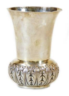 An early 20thC vase, of trumpet shaped form with a leafy bellied base on circular foot, marked ORR.27/silver, 10cm high, 4.8 oz.