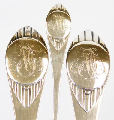 A cased early 20thC Scandinavian three piece service, comprising serving spoon and fork and teaspoon, each with scroll initial heads and plain stems, the serving spoon 20cm high, in an associated case, 4.5oz all in. - 2