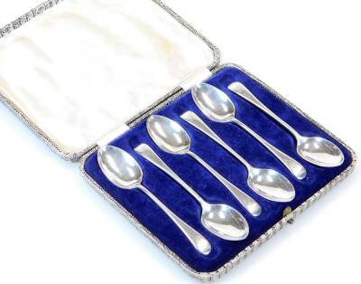 A set of six early 20thC silver teaspoons, old English pattern, initialled with plain bowls, various dates, 2oz. (cased)