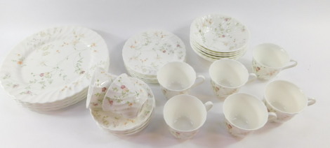 A Wedgwood porcelain part dinner and tea service decorated in the Campion pattern, comprising six dinner plates, six fruit bowls, eight tea cups, six saucers and tea plates.