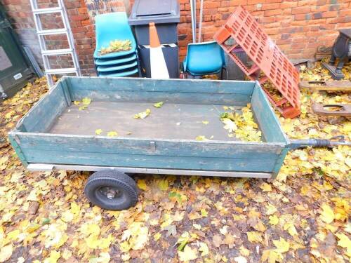 A wooden framed two wheeled trailer, 91cm wide, 186cm deep.