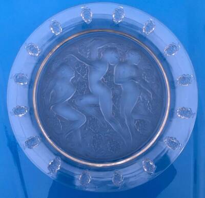 A Lalique clear and frosted glass plate, decorated in the Cote D'or pattern, moulded with the Three Graces and bunches of grapes, etched Lalique, France., 39.5cm diameter.