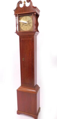 A modern mahogany grandmother clock, of traditional form, with swan neck and turned pillar hood, and brass dial marked E J Goodfellow, WADEBRIDGE, with eight day German strike movement, with oscillating lever escapement, 152cm high.