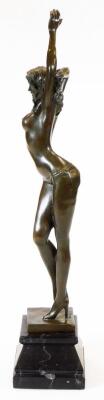 An Art Deco style bronze finish figure of a nude lady, in standing pose with left arm outstretched, on a stepped and inverted marble finish base, indistinctly signed to the back, 58cm high, - 2