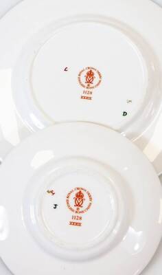 Various Royal Crown Derby Imari plates, saucers, etc., comprising two 22cm diameter plates, a side plate and a 11cm diameter saucer marked 1128. (4) - 5