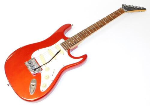 An Encore Coaster six string electric guitar, in red and white trim, 100cm wide.