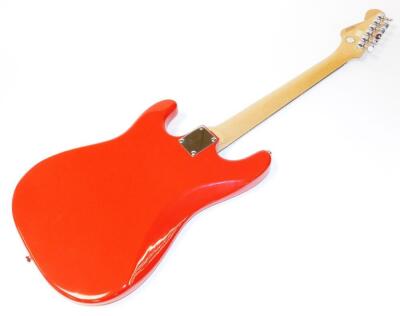 A Squier Fender Bullet six string electric guitar, in red and white colourway, 101cm wide, in associated canvas case. - 4