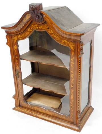 A 19thC Dutch marquetry and walnut cabinet top, the swept cornice surmounted by a carved moulding, the main body profusely decorated with cherubs and flowers, with shaped shelves on a plain moulded base inlaid with further leaves, 101cm high, 74cm wide, 4