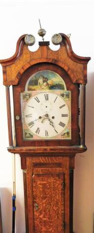 A 19thC oak and mahogany longcase clock, with swan neck pedimented hood, set with brass roundels and an urn finial, raised above a shaped trunk door with a wide cross banding, flanked by quarter columns, the whole raised on stylised ogee bracket feet, wit