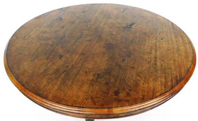 A 19thC tilt top mahogany breakfast table, the plain circular top with a moulded outline on a heavily carved compressed baluster stem, terminating in triple cabriole legs with acanthus capped leaves and scroll feet, when raised 147cm high, the top 122cm d - 2