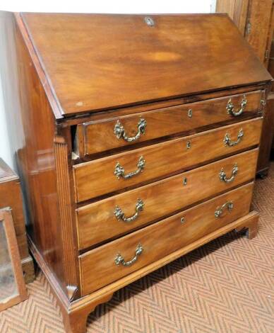 An 18thC mahogany bureau, the plain fall with oval lock revealing a fitted interior with central cupboard flanked by columns, pigeon holes and various drawers, above four long graduated drawers, with elaborate swan neck handles on ogee bracket feet, 107cm