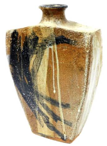 A naively decorated pottery vessel, of shouldered form with compressed stem, splash decorated in black and cream, unmarked, 42cm high.