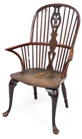 A 19thC yew and elm high back Windsor chair, with an oval stylised Prince of Wales feather splat, shaped arms and seat, on cabriole front legs with pad feet, 112cm high.