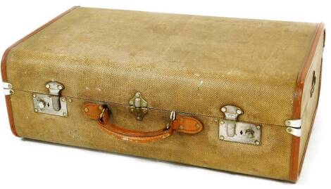 A vintage Over Pond plywood suitcase, with chrome locks and a dome top and pressed body, 61cm wide.