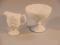 A Sowerby opaque white press glass pedestal sugar bowl and matching cream jug