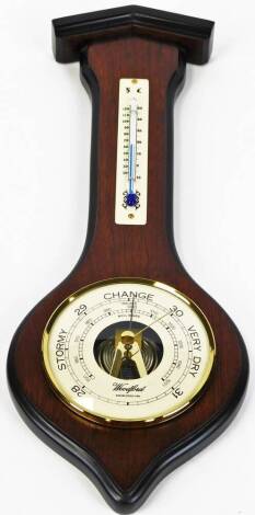 Woodford. A mahogany cased wall barometer and thermometer, in shaped case with 9cm diameter dial, 38cm high.