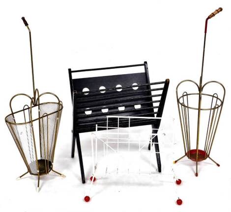 A retro brass and meshwork umbrella stand, formed as an umbrella on quadruple feet, 95cm high, another similar, a wirework newspaper rack, and a folding stand. (4)