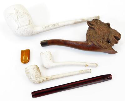 Various pipes, a heavily carved example model with goat head 7cm high, a Donovan Fred Archer commemorative horse racing related pipe, and various others. (a quantity)