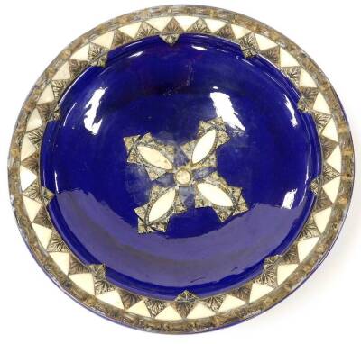 A highly decorative blue glaze pottery bowl, raised with mother of pearl finish and other metal mounts with a shaped centre and raised rim, unmarked, 42cm diameter. - 2