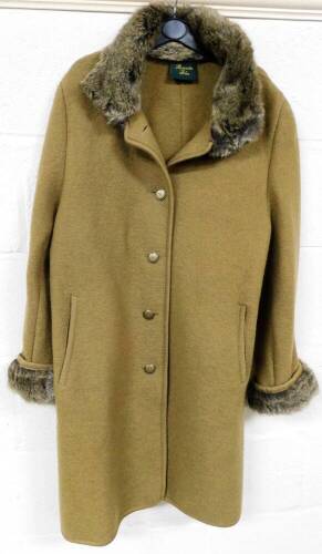 A ladies Rosevita Bles jacket, three quarter length with fur collar and interior label, size unknown.