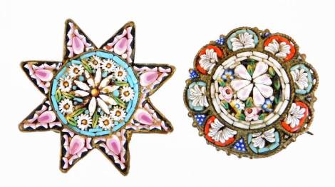 An early 20thC Italian micro mosaic brooch, of circular form, heavily set with flowers in a floral border, 2.5cm diameter, and a further star shaped micro mosaic brooch. (2)