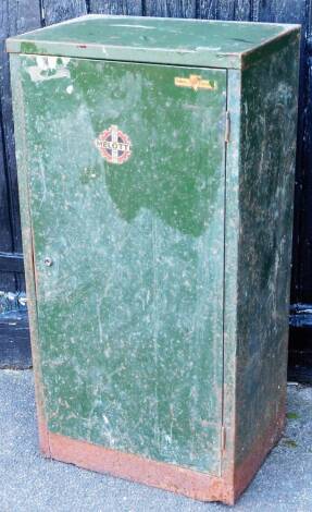 An early 20thC Mellotte Valor Birmingham free standing metal locker, painted green, with labels, 92cm high, 48cm wide, 31cm deep.