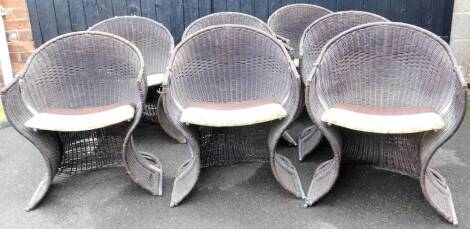 A set of seven Pieff garden chairs, wicker style, with chrome frames and florally upholstered seats, 63cm high.