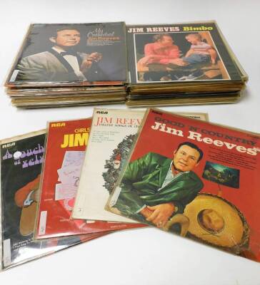 Various records, Jim Reeves, 33rpm, etc., to include We Thank The, Moonlight and Roses, I'll Always Love You, Precious Memories, Pure Gold Volume 1, Twelve Songs of Christmas and a large quantity of various others, a quantity of various Country scrap book - 5
