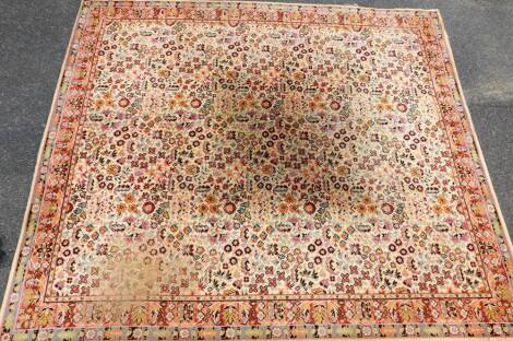 A Boltonian Seemless rug, in floral pattern, decorated predominantly in red, blue and yellow, 275cm x 230cm.