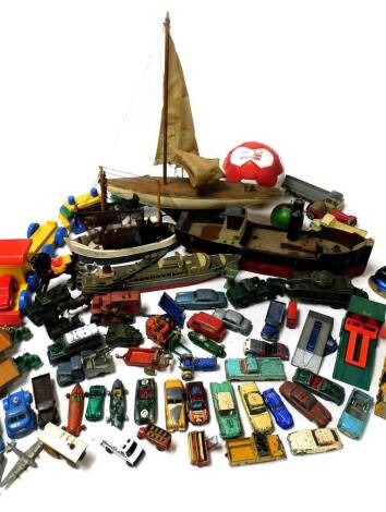 Various toys, games, die cast vehicles, a wooden model of ship titled London, 47cm wide, pond yacht, various figures, Nottingham Forest football, farm animals, other Britains style lead and other farm animals, etc. (a quantity)