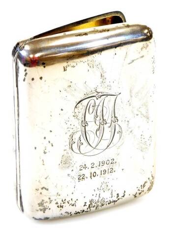 An Edwardian silver cigarette case, of inverted shaped form with initials dated 24.2.1902 to 22.10.1912, Birmingham 1901, 7cm wide, 2.5oz.