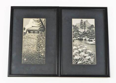 A pair of Japanese black and white woodblock prints, of steps rising towards a temple, and a garden with irises in front of a temple, 24cm x 12cm, both signed in a hexagonal cartouche, probably 1950's, framed and glazed.