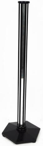 A 20thC Art Deco design standard lamp, with turned glazed stem on a hexagonal base, with modern electrical feature, 129cm high.